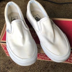 Dingy white vans